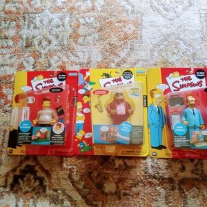 The Simpsons Pack of Three Action Figures - Yellow & Red
